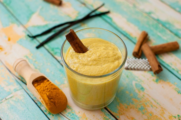 healthy smoothie with turmeric, vanilla, cinnamon and coconut milk